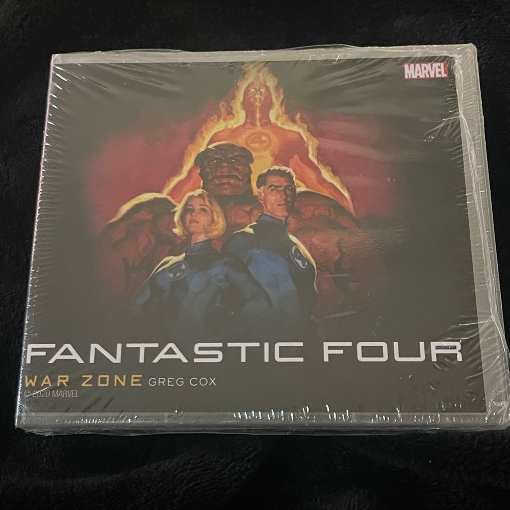 CD audiobook edition of the novel Fantastic Four: War Zone by Greg Cox